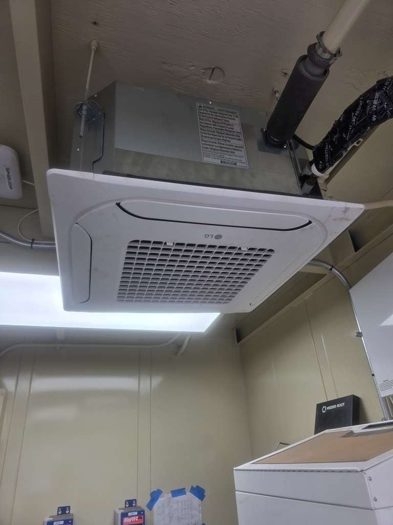 LG 4-way ceiling cassette cooling a fuel station data hut above the tank monitoring console